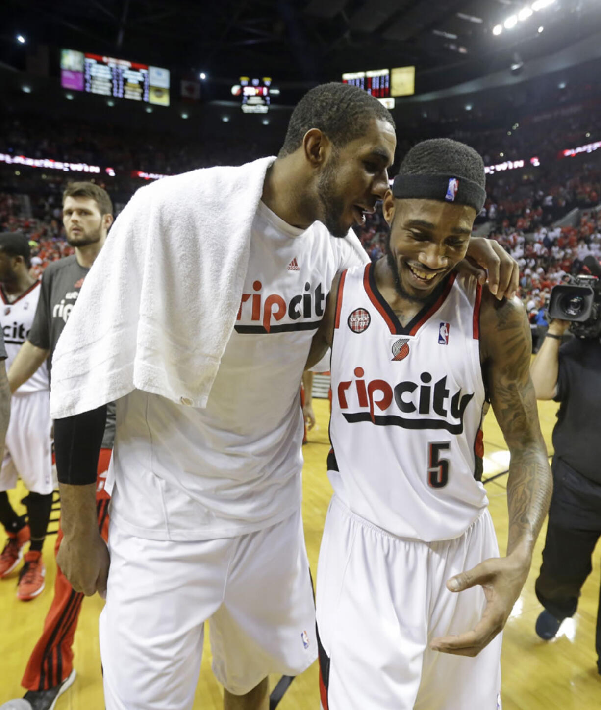 Portland's LaMarcus Aldridge, left, and Will Barton (5) walk off the court after the Game 4 victory.