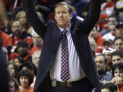 Portland Trail Blazers head coach Terry Stotts directs his team during Game 3 of a Western Conference semifinal NBA basketball playoff series against the San Antonio Spurs, Saturday, May 10, 2014, in Portland, Ore.