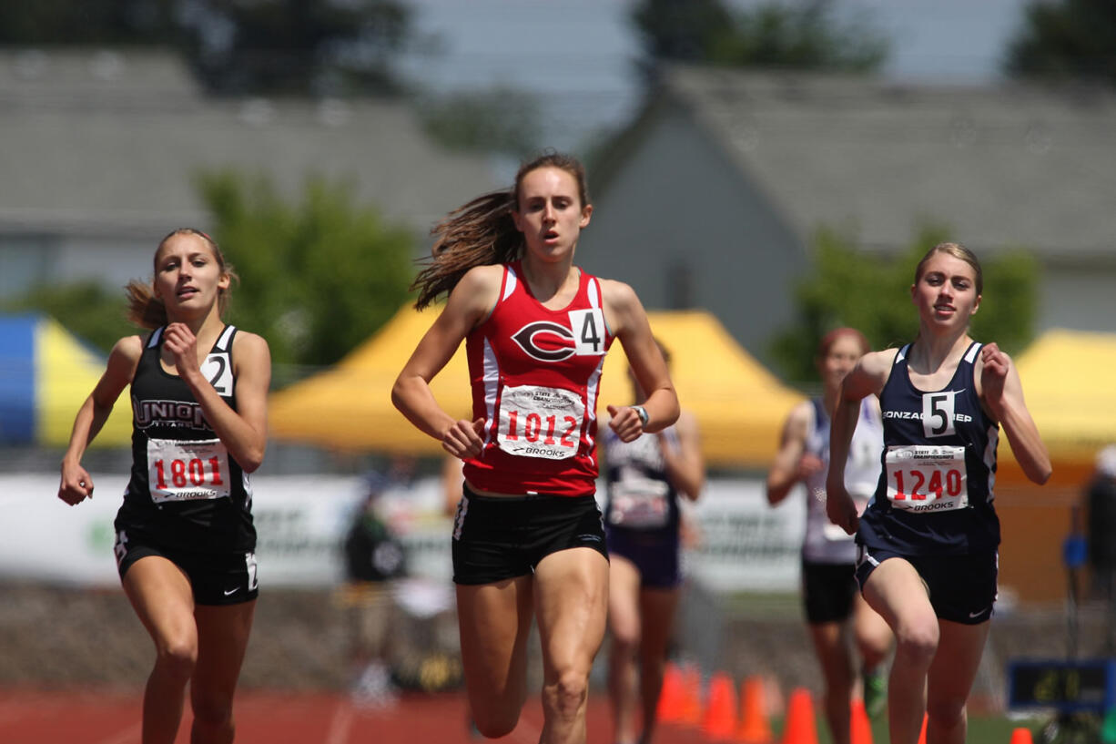 Camas runner Alexa Efraimson (4) runs with the pack during the Prelims of the Girls 4A 800 Meter Run at the Washington State Track and Field Meet on May 30 in Tacoma.