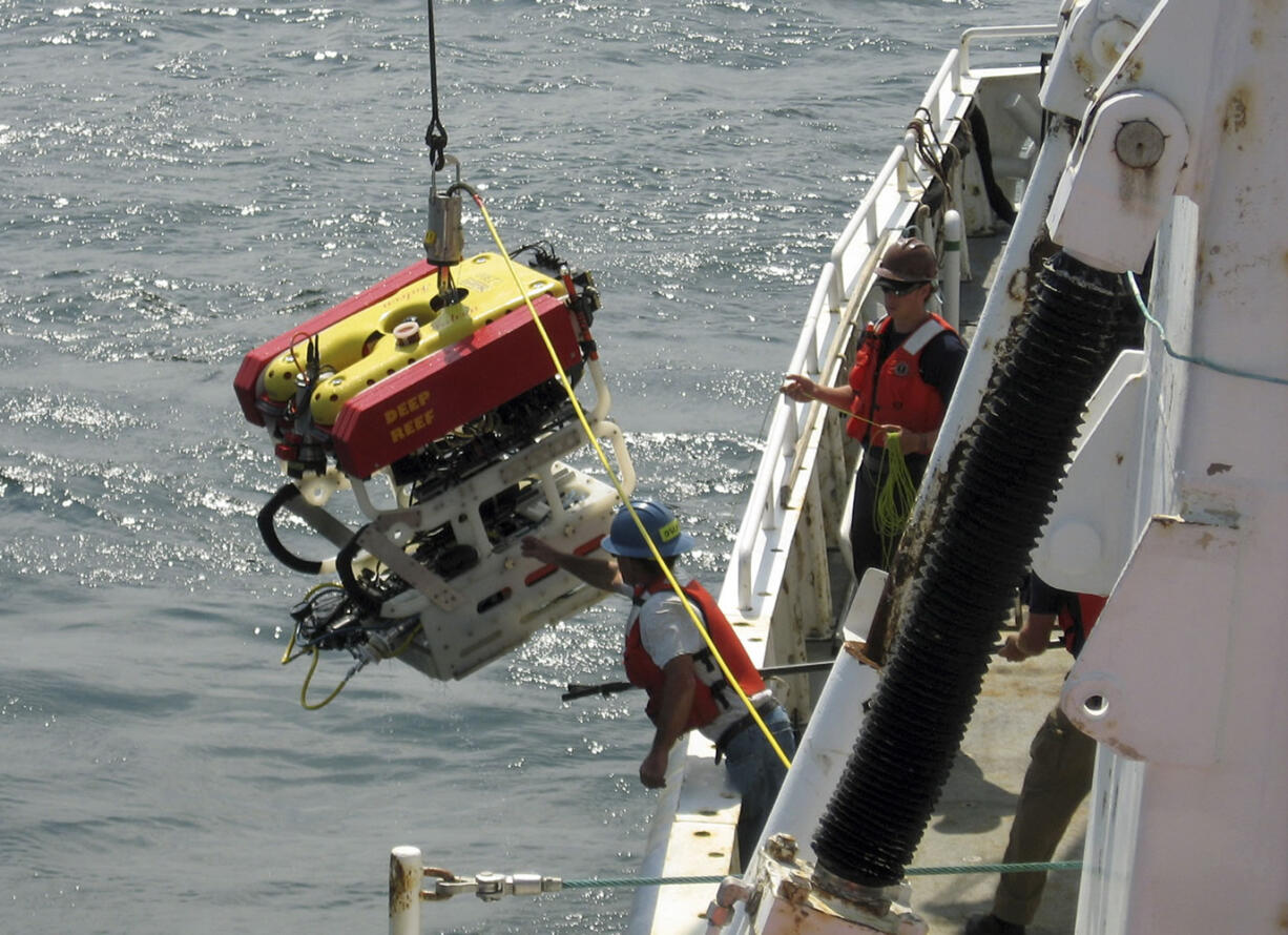 In this photo provided by the University of Rhode Island, scientists deploy a remotely operated submersible vehicle Friday to explore a German U-boat that sank at the end of World War II several miles off the Rhode Island coast. Scientists from the University's Inner Space Center, Connecticut's Ocean Exploration Trust and the U.S. Coast Guard Academy are attempting the exploration during a five-day trip that lasts through Sunday.