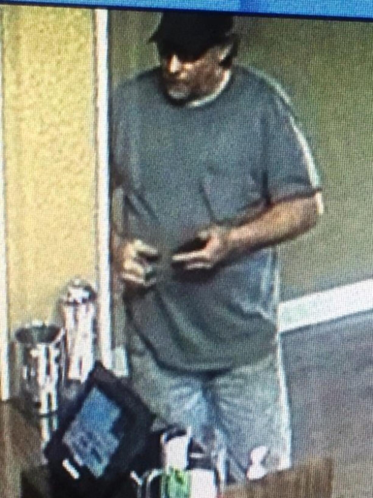 The Battle Ground Police Department arrested this man -- Battle Ground's Craig Corder, 50 -- after sharing this image from surveillance video at Tiger Bowl, where the department said Corder allegedly stole money from the bowling alley's till Sept. 22.