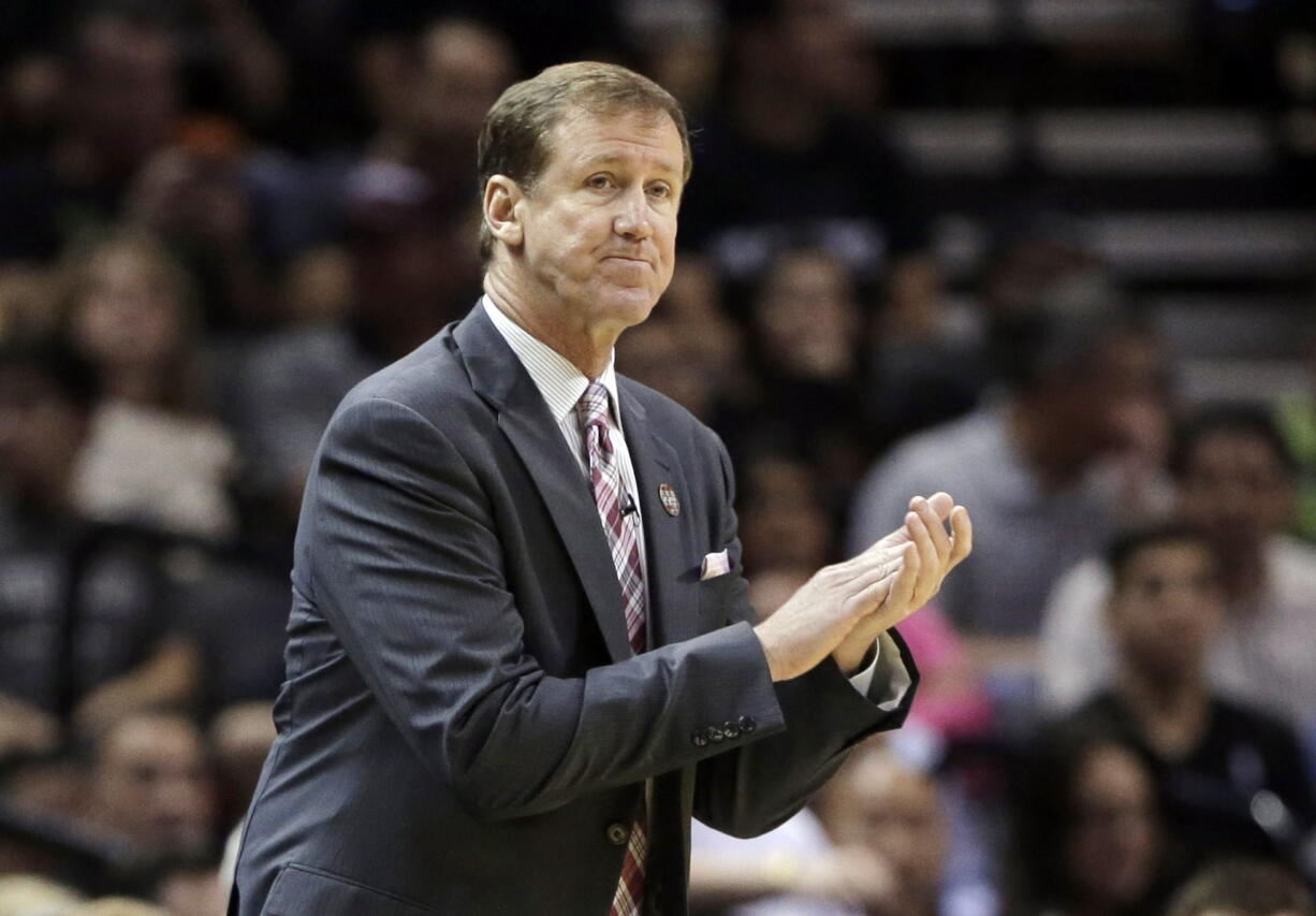 Portland Trail Blazers head coach Terry Stotts watches during the second half of Game 1 of a Western Conference semifinal NBA basketball playoff series against the San Antonio Spurs, Tuesday, May 6, 2014, in San Antonio.