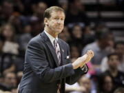 Portland Trail Blazers head coach Terry Stotts watches during the second half of Game 1 of a Western Conference semifinal NBA basketball playoff series against the San Antonio Spurs, Tuesday, May 6, 2014, in San Antonio.