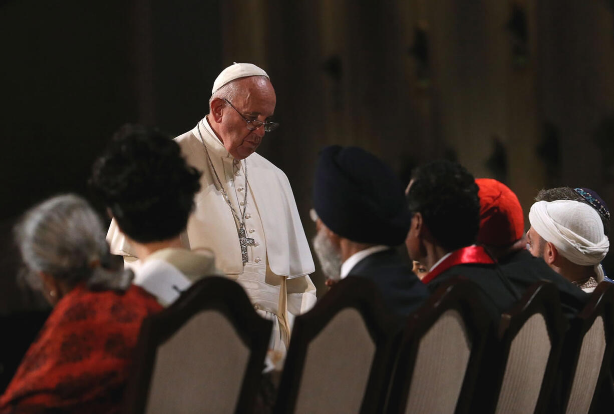 Pope Francis looks on during a multi-religious prayer for peace at the 9/11 Memorial and Museum on Sept. 25, 2015 in New York. Pope Francis is in New York on a two day visit and will carry out a number of engagements including a Papal motorcade through Central Park and a Mass in Madison Square Garden.  (Justin Sullivan/Getty Images via AP, Pool)Pope Francis looks on during a multi-religious prayer for peace at the 9/11 Memorial and Museum on Sept. 25, 2015 in New York. Pope Francis is in New York on a two day visit and will carry out a number of engagements including a Papal motorcade through Central Park and a Mass in Madison Square Garden.