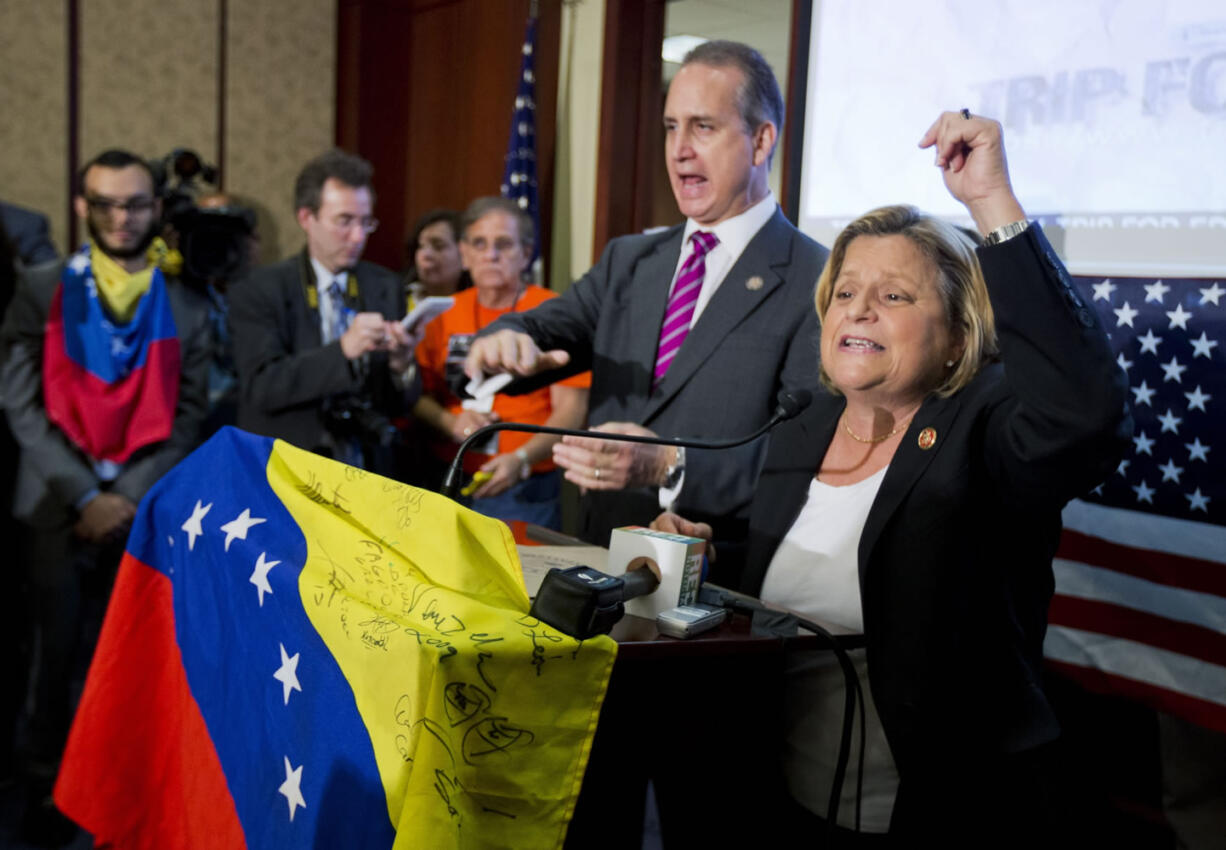 Rep. Ileana Ros-Lehtinen, R-Fla., right, and Rep.