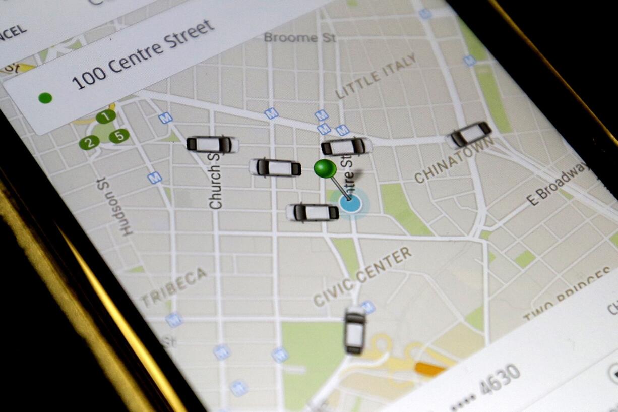 Associated Press files
The Uber app displays cars available in downtown Manhattan  in New York.