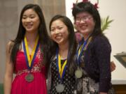 Violinist Fumika Mizuno, 15, from left, pianist Hannah Moon, 16, and pianist Valerie Ding, 16, win gold medals at the Vancouver Symphony Orchestra's 20th Young Artists Competition on Feb.