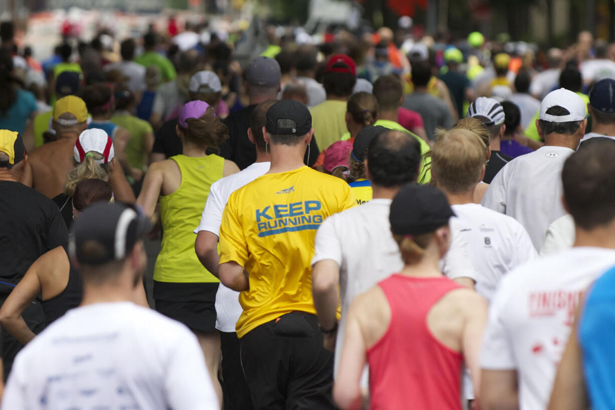 Runners start the 2013 Vancouver USA Marathon.