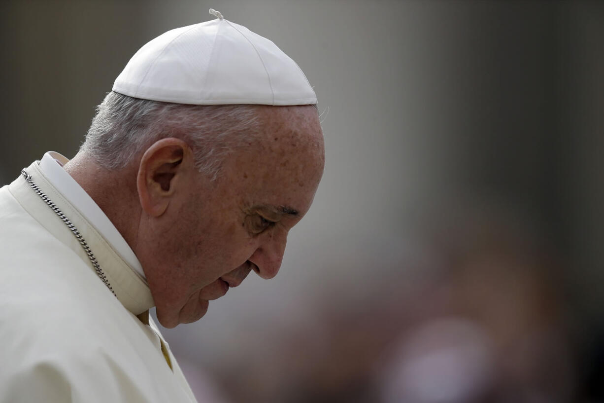 Pope Francis arrives for the weekly general audience in St. Peter's Square at the Vatican on Wednesday.