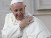 Pope Francis arrives for his weekly general audience in St. Peter's Square at the Vatican Sept. 9.