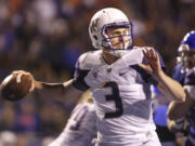 Washington quarterback Jake Browning looks for a receiver during the first half of an NCAA college football game against Boise State in Boise, Idaho, on Friday, Sept. 4, 2015.