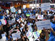 Hundreds of students rally Thursday   at Summit Sierra public charter school in Seattle's International District. Charter school students, parents and staff rallied to support the schools and to call for Governor Jay Inlsee and the legislature to show their support after the State Supreme Court ruled state funding of the schools to be unconstitutional.