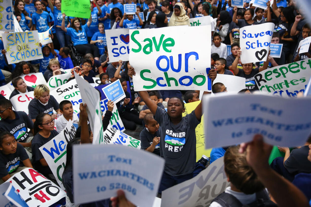 Hundreds of students rally Thursday, September 10, 2015, at Summit Sierra public charter school in Seattle's International District. Charter school students, parents and staff rallied to support the schools and to call for Governor Jay Inlsee and the legislature to show their support after the State Supreme Court ruled state funding of the schools to be unconstitutional.