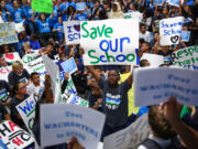 Hundreds of students rally Thursday, September 10, 2015, at Summit Sierra public charter school in Seattle's International District. Charter school students, parents and staff rallied to support the schools and to call for Governor Jay Inlsee and the legislature to show their support after the State Supreme Court ruled state funding of the schools to be unconstitutional.