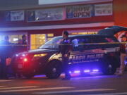 Pasco Police officers investigate the scene of the Feb. 10 shooting of Antonio Zambrano-Montes, who was shot by police in Pasco. A prosecutor says three police officers in Washington state who fatally shot a rock-throwing Mexican immigrant in February will not face criminal charges.