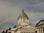 A rainbow is seen behind the Washington state Capitol last month in Olympia.