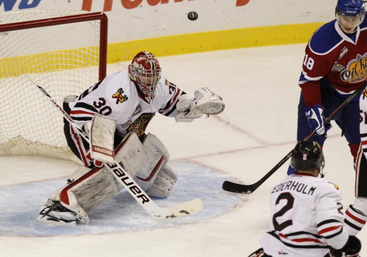 Portland Winterhawks goalie Corbin Boes deflects a shot vs. the Edmonton Oil Kings.