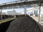 Oregon state regulators have rejected a proposal for a coal terminal on the Columbia River that would be a conduit for exporting millions of tons of American coal a year to Asia.