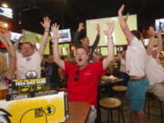 Clark County soccer fans at Buffalo Wild Wings in Hazel Dell celebrate a U.S. goal during Sunday's World Cup match.