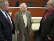 Clark County Commissioners  David Madore, left, and Tom Mielke, right, talk to Ed Barnes, on Tuesday June 3, 2014, after appointing him to fill the seat on the board that was vacated by Steve Stuart earlier this year.