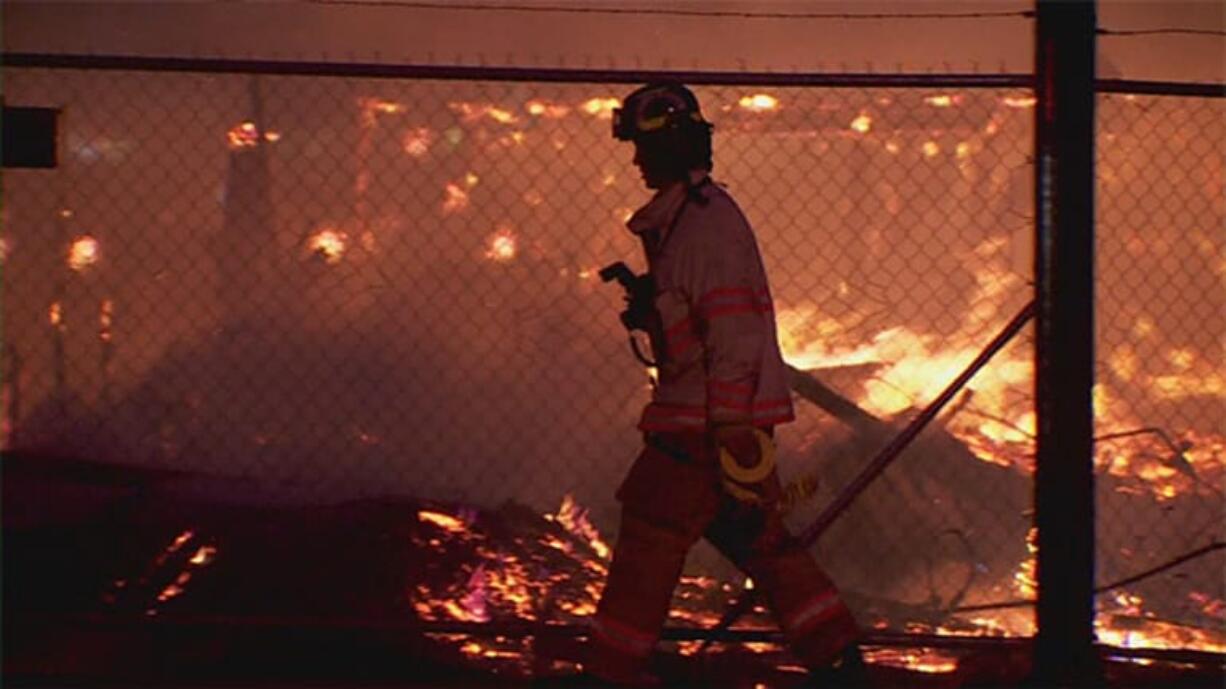 Forty firefighters from the Vancouver and Camas-Washougal fire departments responded Friday to an early-morning two-alarm blaze that destroyed an apartment complex still under construction.