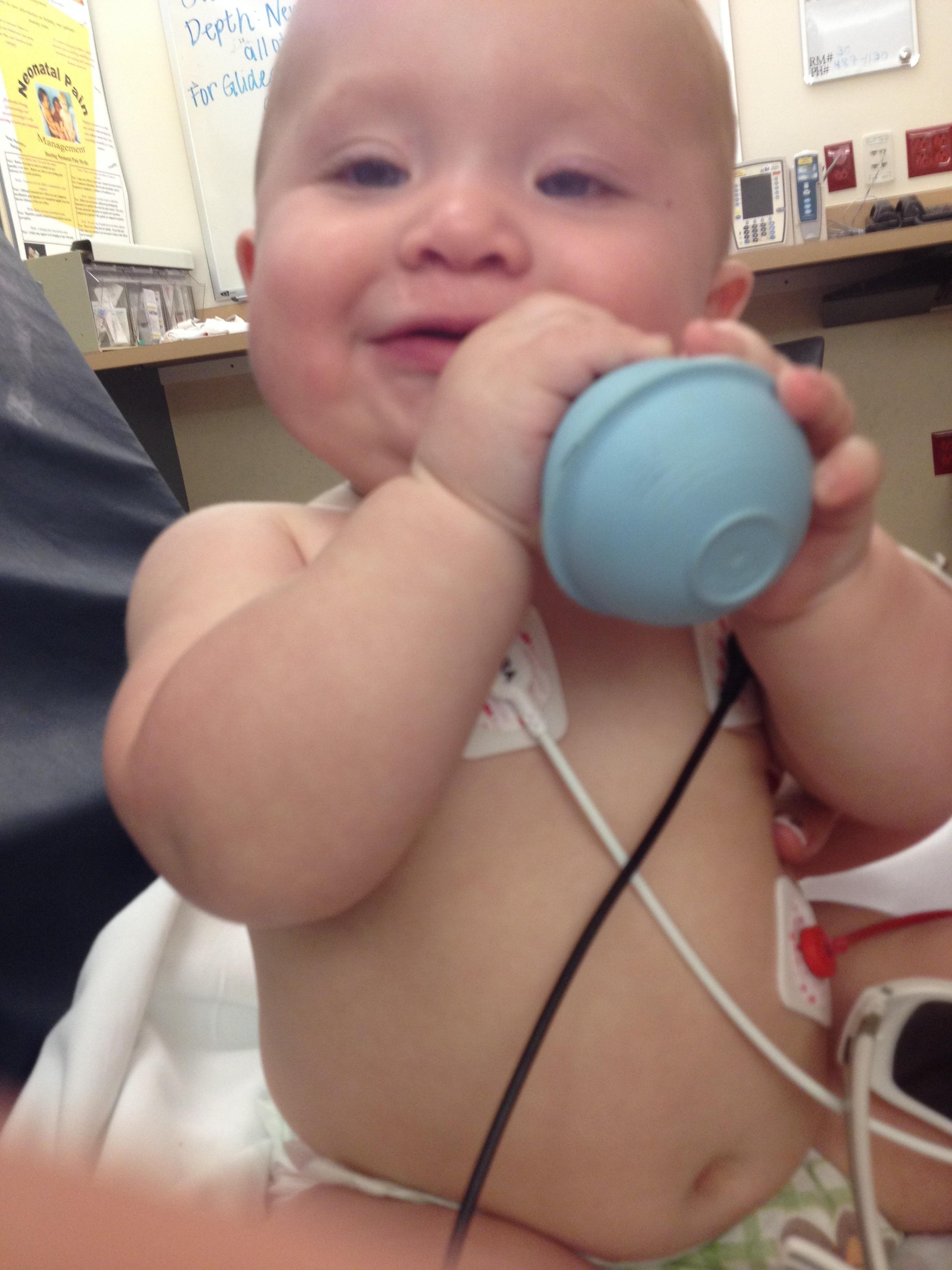 Hank Duncan smiles Sunday night in the hospital after he was saved from drowning thanks to the quick action of his family.