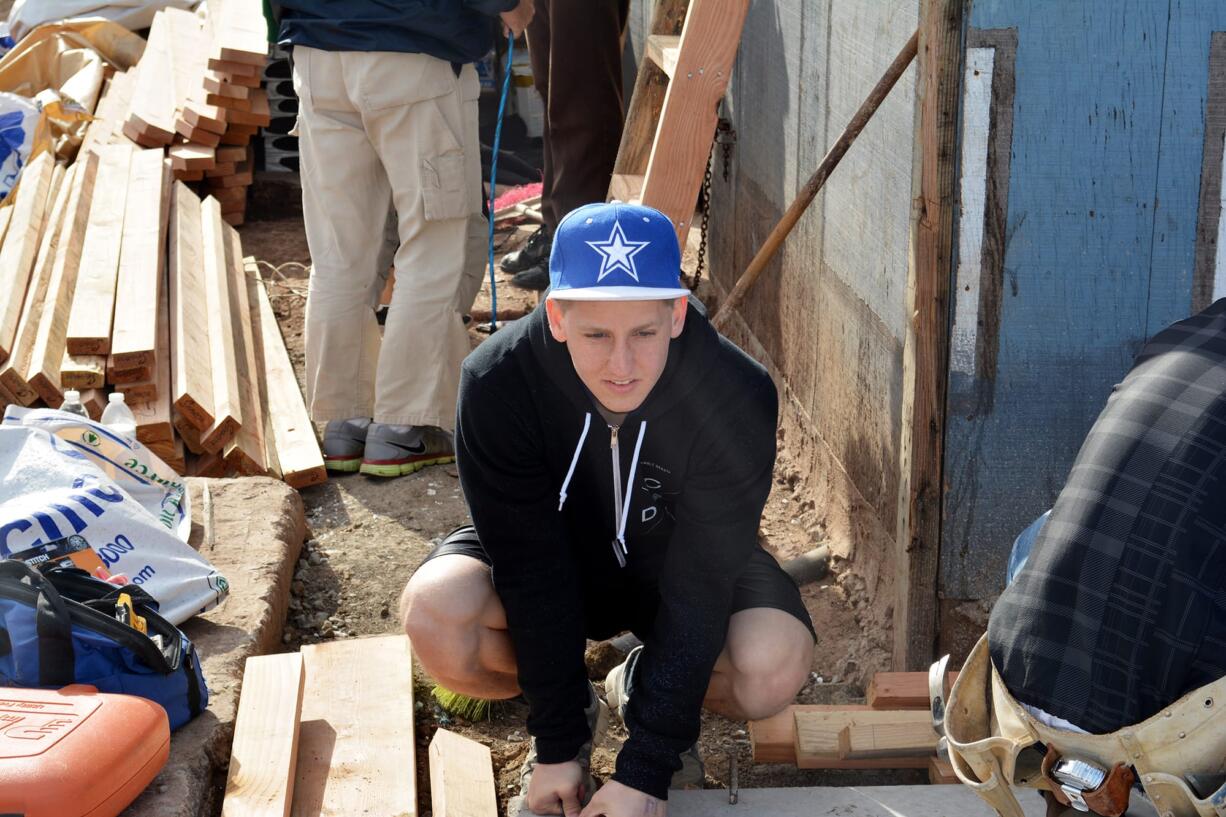 Battle Ground: Jesse Zalk, a 2012 Prairie High School graduate, helps build a house in Mexico during spring break in March.