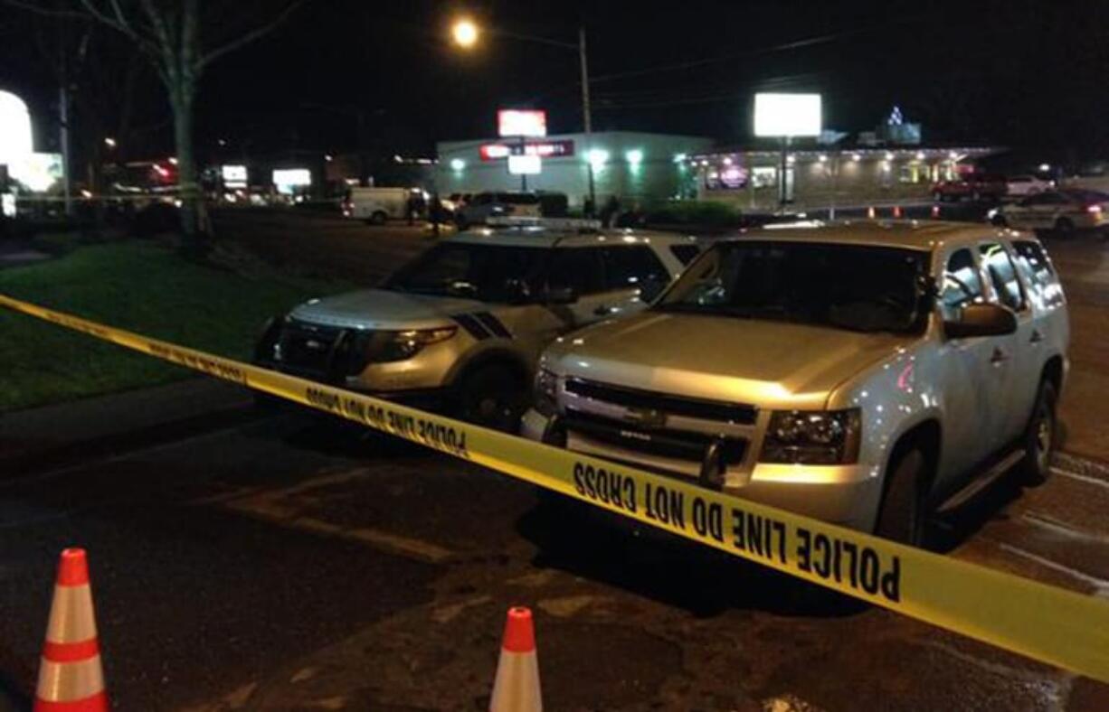 Police investigate the scene of a fatal vehicle-pedestrian crash on Northeast Third Avenue near Weir Street in Camas on Tuesday.