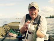 Chuck Bryan of Vancouver with a spring chinook caught Friday near Tomahawk Island in the Columbia River.