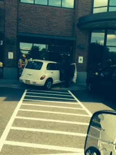 A motorist lost control and crashed into a hair salon Monday.