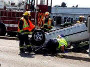 A vehicle flipped over in an auto accident this afternoon at Fourth Plain Boulevard and Andresen Road.