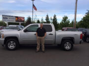 Michael Rudolph, 44, of Battle Ground, and his Chevrolet Silverado truck are seen in this photo provided by the Clark County Sheriff's Office Tuesday, Dec.