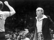 Portland Trail Blazer coach Jack Ramsay questions a call by the ref during championship play in 1977.