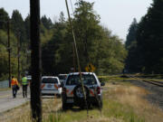 Emergency officials respond to the scene where an Amtrak train collided with an SUV Sunday morning in Vancouver, killing the man who was driving the SUV.