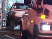 A truck reportedly stolen in Oregon slammed into Walgreens on Main Street in Vancouver. A few suspects in the vehicle tried to access an ATM in the store and fled before police arrived.