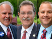 John Graser, center, endorses Chuck Atkins, left, for Clark County Sheriff.