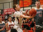 Collin Prangley glides by the Bearcats Friday, at Washougal High School. The Panthers defeated W.F.