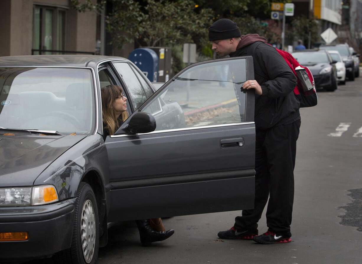 Seattle Times reporter Tricia Romano drops off her car with Luke of on-demand personal valet app Zirx.