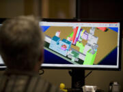 A mechanical engineer works on a 3D CAD model at Sigma Design in Vancouver in 2011.