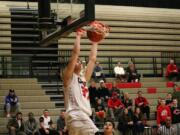 Trevor Jasinsky kick started the offense with a 3-pointer and this slam dunk Wednesday, at Camas High School. The Papermakers defeated Southridge, of Surrey, B.C., 56-40.