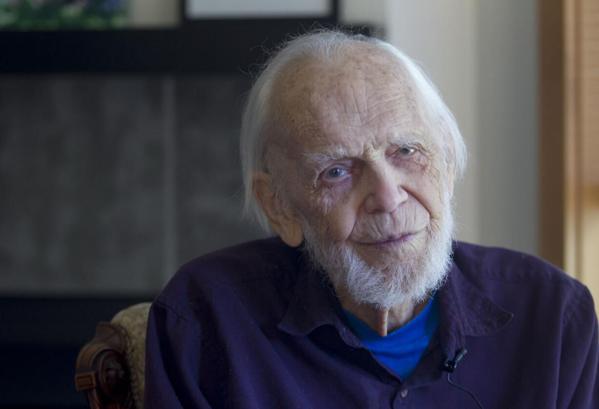 Centenarian Harris Dusenbery at his downtown condo in December 2014.