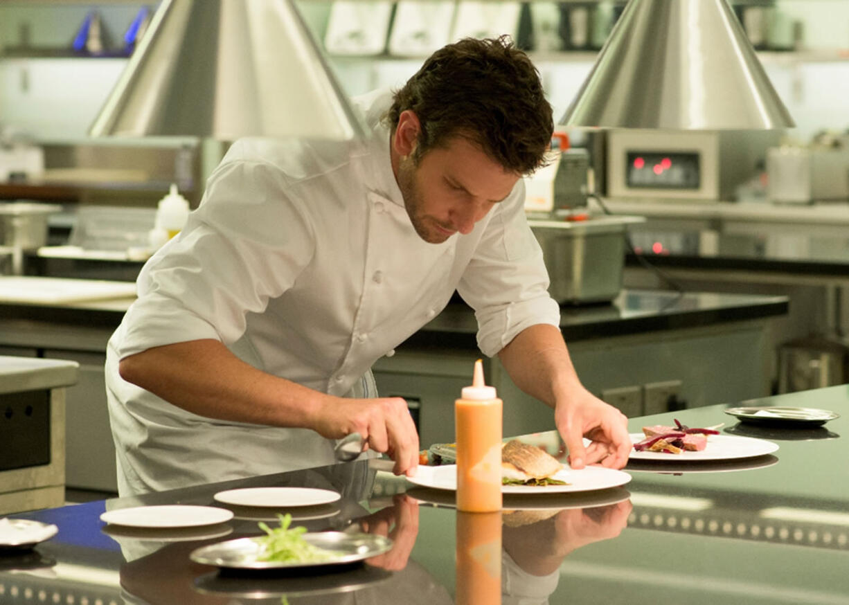 Bradley Cooper stars as a chef trying to overcome his demons in &quot;Burnt.&quot; (Alex Bailey/The Weinstein Company)