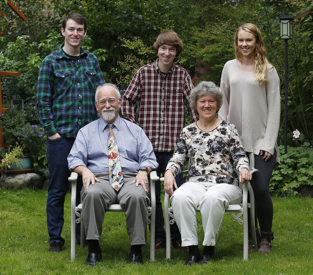 Walter Lowe, 67, with wife Annerose, 56, and three of their five children: from left, Henry, 23; Elliott, 16; and Francine, 20; at their Maple Valley home.