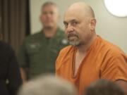 Michael A. Conley, 49, makes a first appearance Monday in Clark County Superior Court in connection with a stabbing Thursday night. A man was dropped off at a hospital with life-threatening stab wounds.