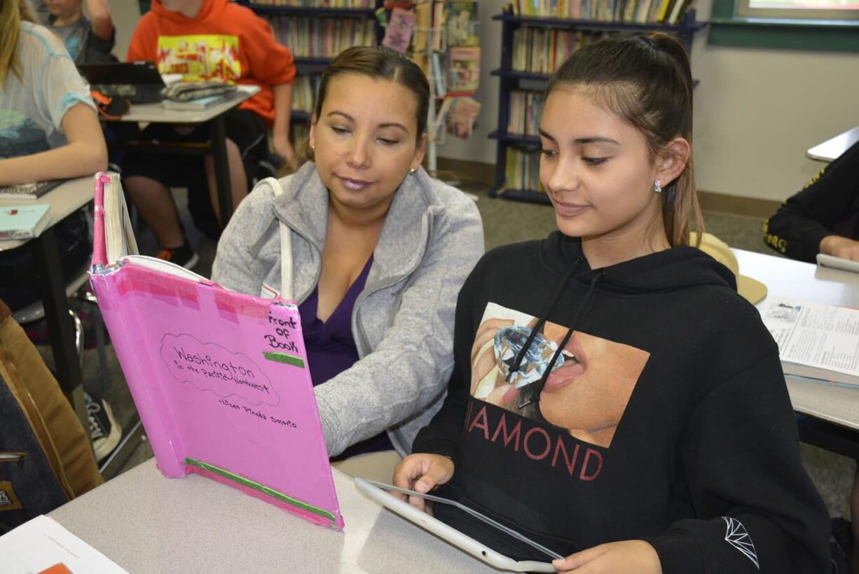 Washougal: Elva Solorio, left, and Lize Pineda at Canyon Creek Middle School&#039;s third annual Bring Your Parent to School Day.