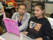 Washougal: Elva Solorio, left, and Lize Pineda at Canyon Creek Middle School&#039;s third annual Bring Your Parent to School Day.