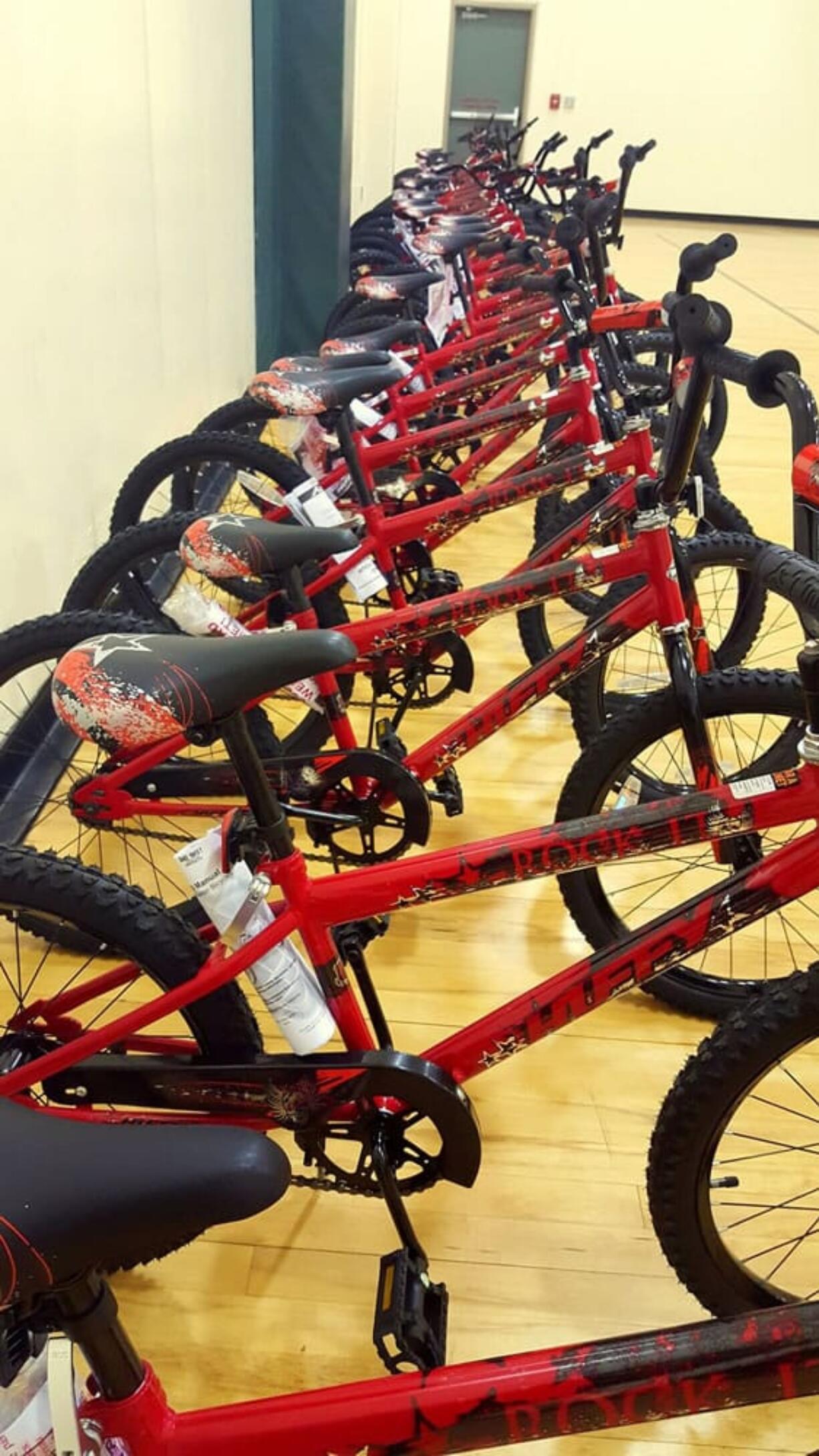 Five Corners: Employees at Centerline Solutions in Vancouver built 28 bikes for children at the Clark County Family YMCA.