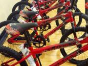 Five Corners: Employees at Centerline Solutions in Vancouver built 28 bikes for children at the Clark County Family YMCA.