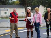 Woodland: Woodland Mayor Grover Laseke, from left, Miss Woodland 2015 Taylor Vossen and Woodland councilors Susan Humbyrd and Marshall Allen are a ribbon-cutting ceremony to announce the completion of improvements to the state Highway 503 and East Scott Avenue roundabout intersection.