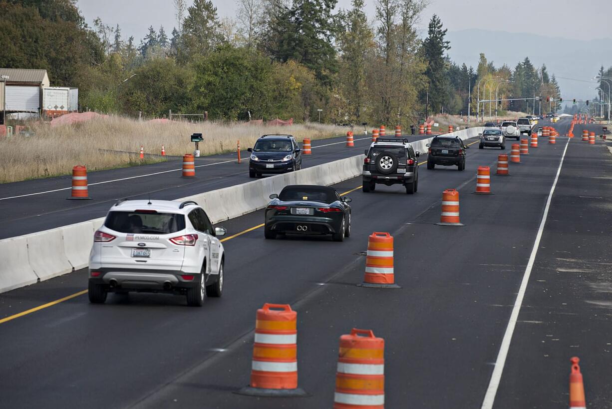 Construction crews are in the process of installing about 20,000 feet of median barrier along state Highway 502 between Interstate 5 and Battle Ground.